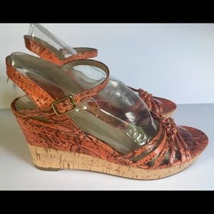 Bandolino orange snakeskin wedge sandals.